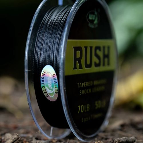 Katran RUSH Tapered Braided Shock Leader spool at an angle showing braid and partial label