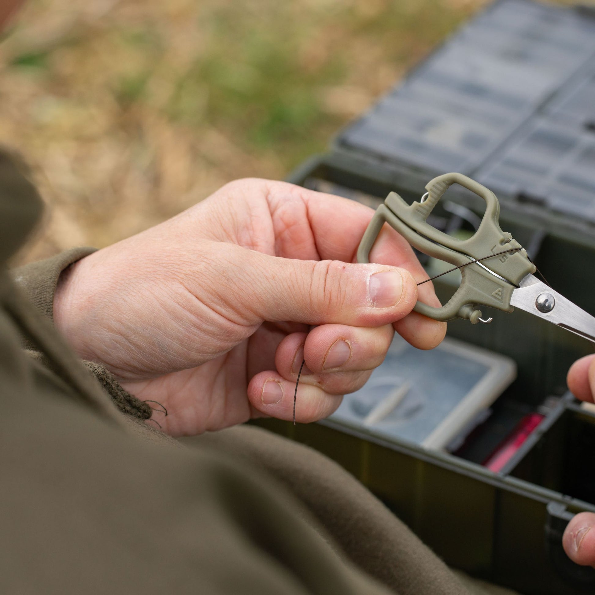 Evolve Rig Scissors with carp fishing rig materials