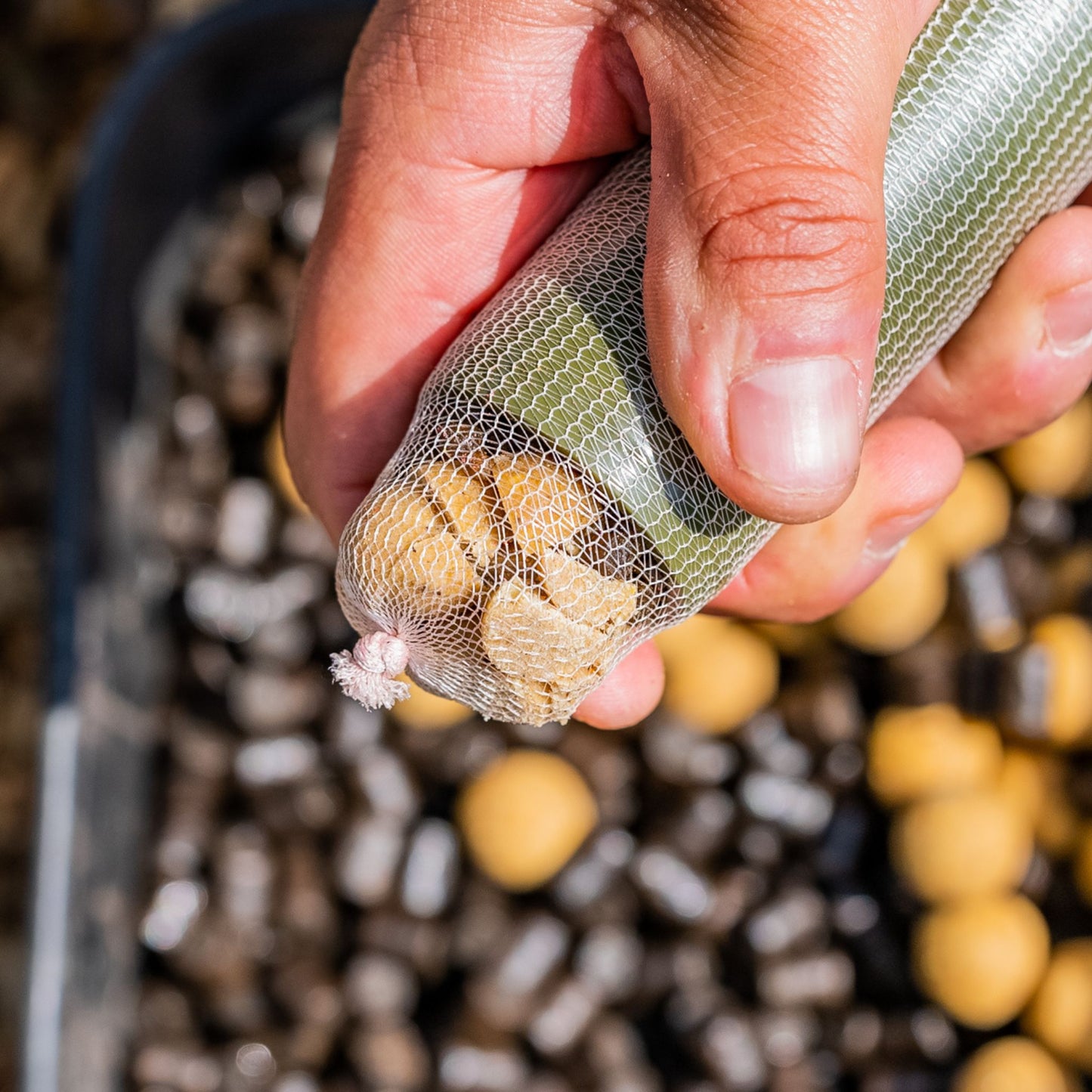 Step 5: Squeeze bait through pipe into PVA mesh