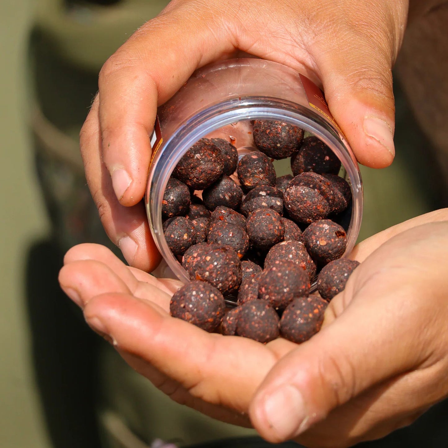 OMC Paella Boosted Cured Hookbaits open tub showing mixed 15 mm and 18 mm hookbaits