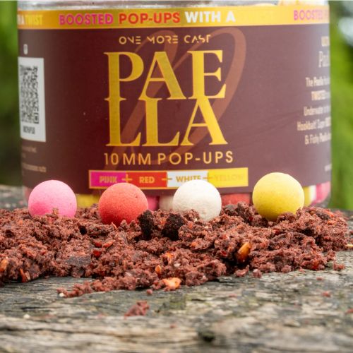OMC Paella Boosted Mini Fluoro Pop Ups 10 mm - 200 ml tub in background with individual fluoro pop ups displayed in the foreground showing all available colours