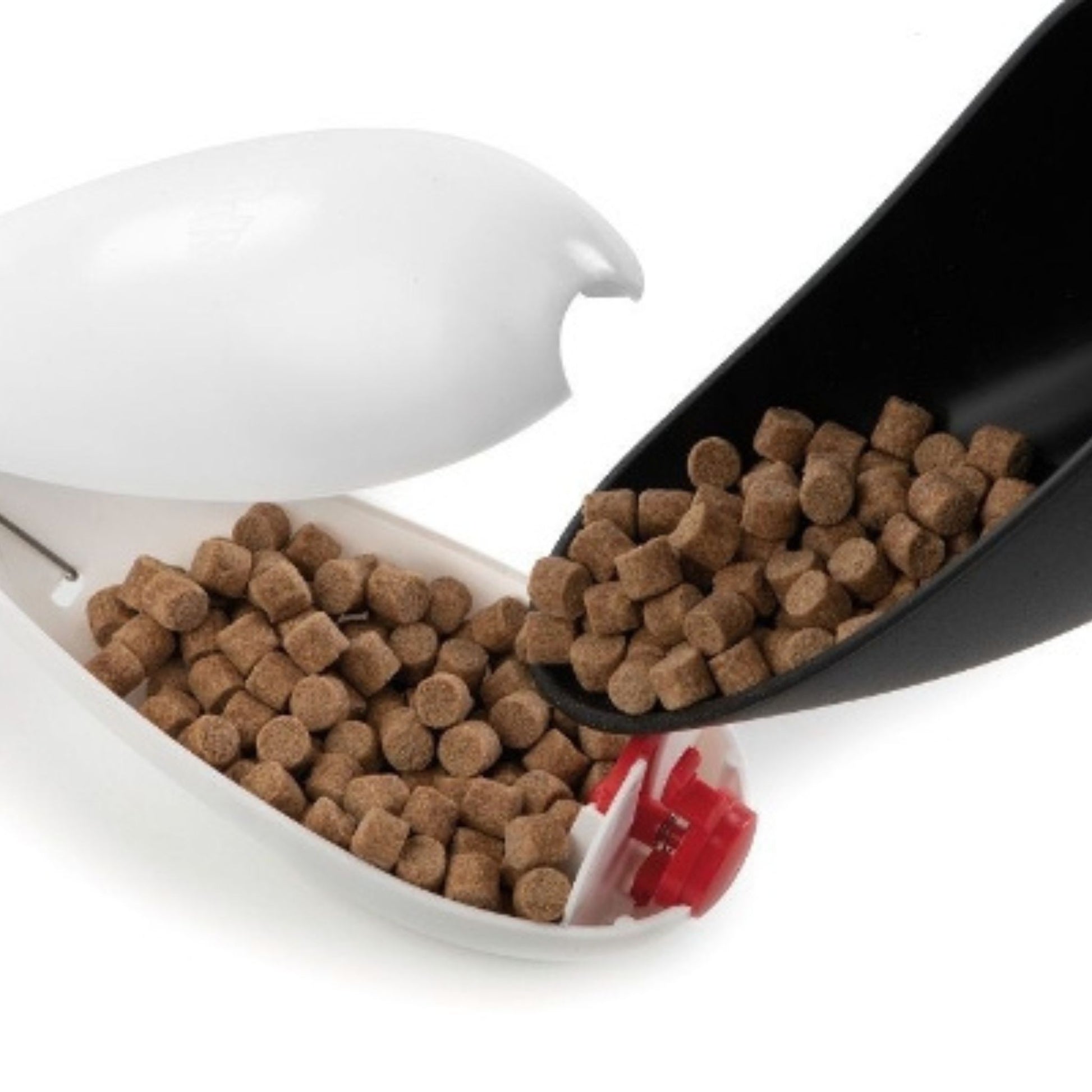 Spomb molded bait scoop filling Spomb rocket with bait